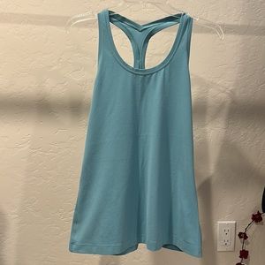 Lululemon cool racer back tank size 8/10 regular length. 3 colors available.